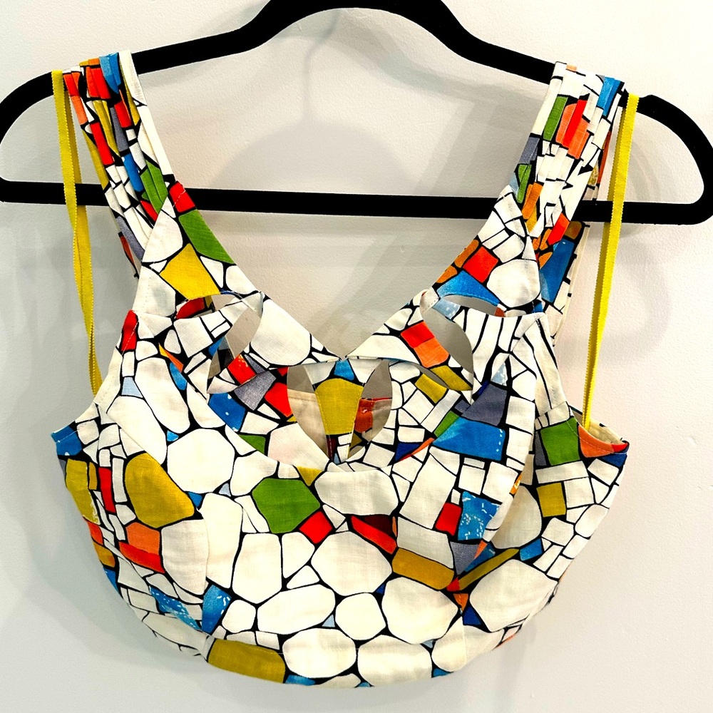 Cropped blouse by Maeve Mukti colored abstract print with pleated straps. Size 0
